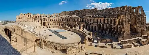 Image 10Amphitheatre of El JemPhotograph: Poco a pocoPanoramic view of the Amphitheatre of El Jem, an archeological site in the city of El Djem, Tunisia. The amphitheatre, one of the best-preserved Roman ruins and a UNESCO World Heritage Site since 1979, was built around 238 AD, when modern Tunisia belonged to the Roman province of Africa. It is the third-biggest amphitheatre in the world, with axes of 148 m (486 ft) and 122 m (400 ft) and a seating capacity of 35,000, unique in Africa.More selected pictures