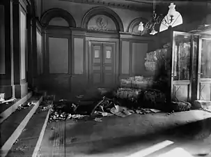 Lobby after or during the 1918 Battle of Helsinki, with the entryway barricaded
