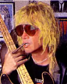 Danny Sheridan with his 1951 Fender
Precision Bass in a photograph that appeared in Bass Player Magazine, October 2001. (Photo by Carol Sheridan. Used with permission)