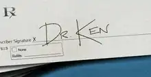 A prescription note signed "Dr. Ken"