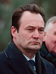 Face of a middle-aged Caucasian male in a cold outdoor setting