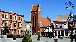 Main church and an 18th-century timber frame tavern on the marketplace