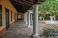 Colonial architecture, as in this courtyard at Coro, presents a parallel with the railway station