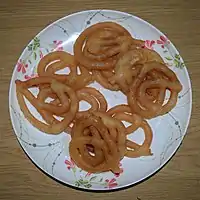 Jilapi in Bangladesh, generally consumed as a sweetmeat, is a popular starter at social events.