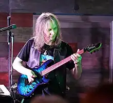 Bainbridge performing with Lifesigns in 2023