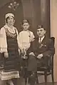An immigrant family from the village of Banitsa (today's Vevi, Florina region) wearing MPO hats, c. 1930