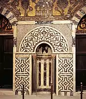 Mihrab of the Mausoleum of Sultan Baybars in Damascus (built 1277–1281), with marble and glass mosaics
