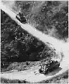 U.S. medium tanks, manned by Chinese and American crews, use the Burma Road for the first time after the combined Allied offensive had broken the two-year Japanese control of the only overland supply route to China., ca. 1945.