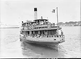 In her last year as a steamer with updated yellow and green painted livery