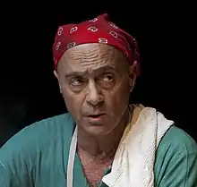 Salim Daw performs in a theatrical production