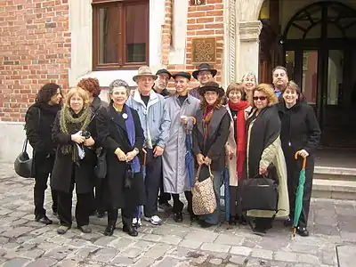 Szyk Society honorary board member Stanislaw Obirek (center, with umbrella) with Irvin Ungar and members of The Arthur Szyk Society in Poland for the Szyk Renaissance Tour, October 2005