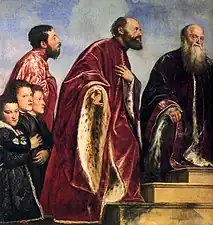 Titian used glazes of red lake to create the vivid crimson of the robes in The Vendramin Family Venerating a Relic of the True Cross, completed 1550–60 (detail).