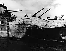 Image 38The light cruiser HMAS Hobart showing torpedo damage inflicted by a Japanese submarine on 20 July 1943. Hobart did not return to service until December 1944. (from History of the Royal Australian Navy)
