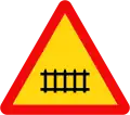 210: Railway crossing with gates ahead