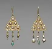 Pair of Byzantine earrings; 7th century; gold, pearls, glass and emeralds; 10.2 by 4.5 centimetres (4.0 in × 1.8 in); Cleveland Museum of Art (Cleveland)